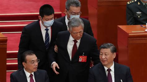 Whats going on with Hu Jintao being escorted out of the CPC